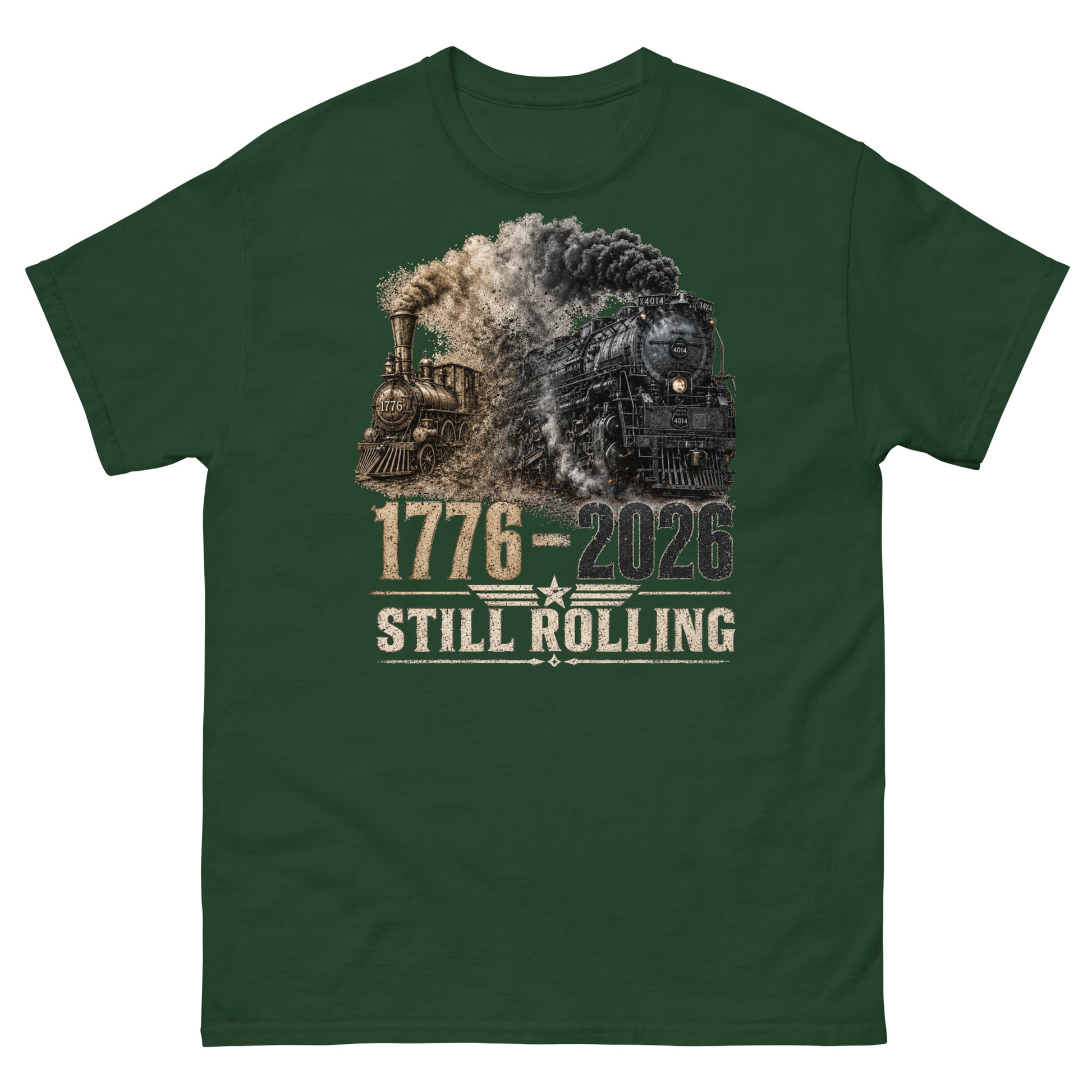 Forest green t-shirt featuring a detailed graphic of two steam locomotives from different eras emerging from heavy smoke side-by-side, with bold distressed text reading "1776-2026" and "STILL ROLLING" flanked by a vintage star and wings emblem.