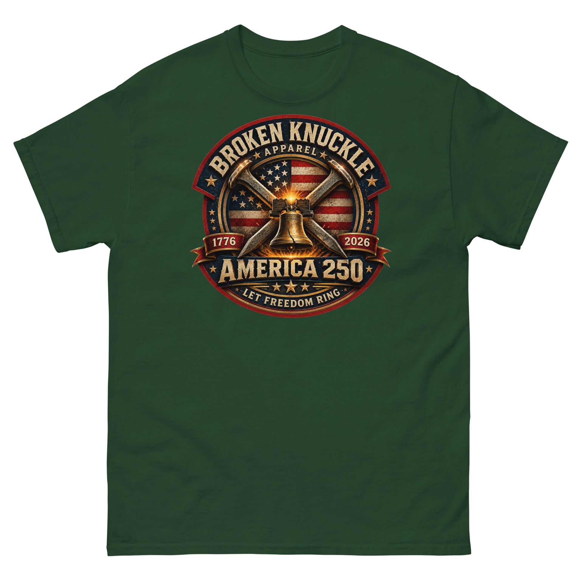 Forest green t-shirt featuring a circular patriotic graphic. The design includes an American flag background, two crossed railroad spikes, and a glowing Liberty Bell in the center. Text around the badge reads "BROKEN KNUCKLE APPAREL", "1776", "2026", "AMERICA 250", and "LET FREEDOM RING".