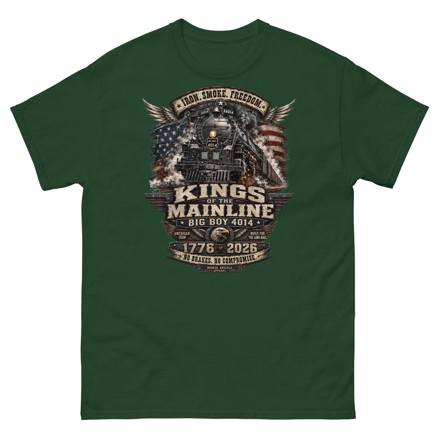 Forest green t-shirt featuring a highly detailed patriotic graphic. The Big Boy 4014 steam locomotive is centered against a distressed American flag and wings. A banner at the top reads "IRON. SMOKE. FREEDOM." Large text reads "KINGS OF THE MAINLINE" and "BIG BOY 4014". Below is a bald eagle head between badges reading "AMERICAN IRON" and "BUILT FOR THE LONG HAUL". The bottom features "1776 - 2026", "NO BRAKES. NO COMPROMISE.", and "BROKEN KNUCKLE APPAREL".