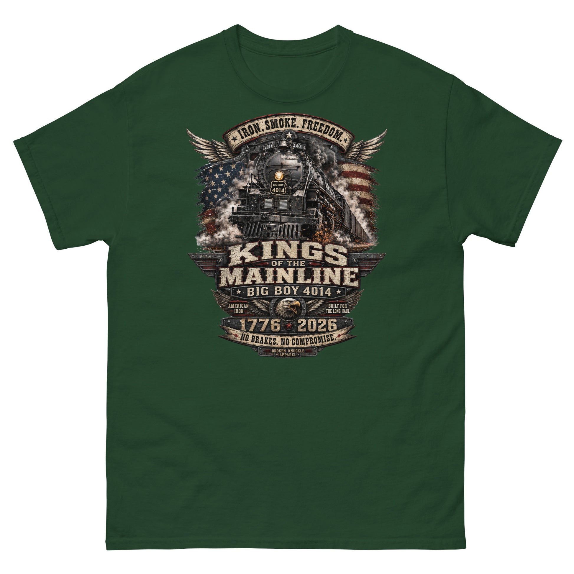 Forest green t-shirt featuring a highly detailed patriotic graphic. The Big Boy 4014 steam locomotive is centered against a distressed American flag and wings. A banner at the top reads "IRON. SMOKE. FREEDOM." Large text reads "KINGS OF THE MAINLINE" and "BIG BOY 4014". Below is a bald eagle head between badges reading "AMERICAN IRON" and "BUILT FOR THE LONG HAUL". The bottom features "1776 - 2026", "NO BRAKES. NO COMPROMISE.", and "BROKEN KNUCKLE APPAREL".