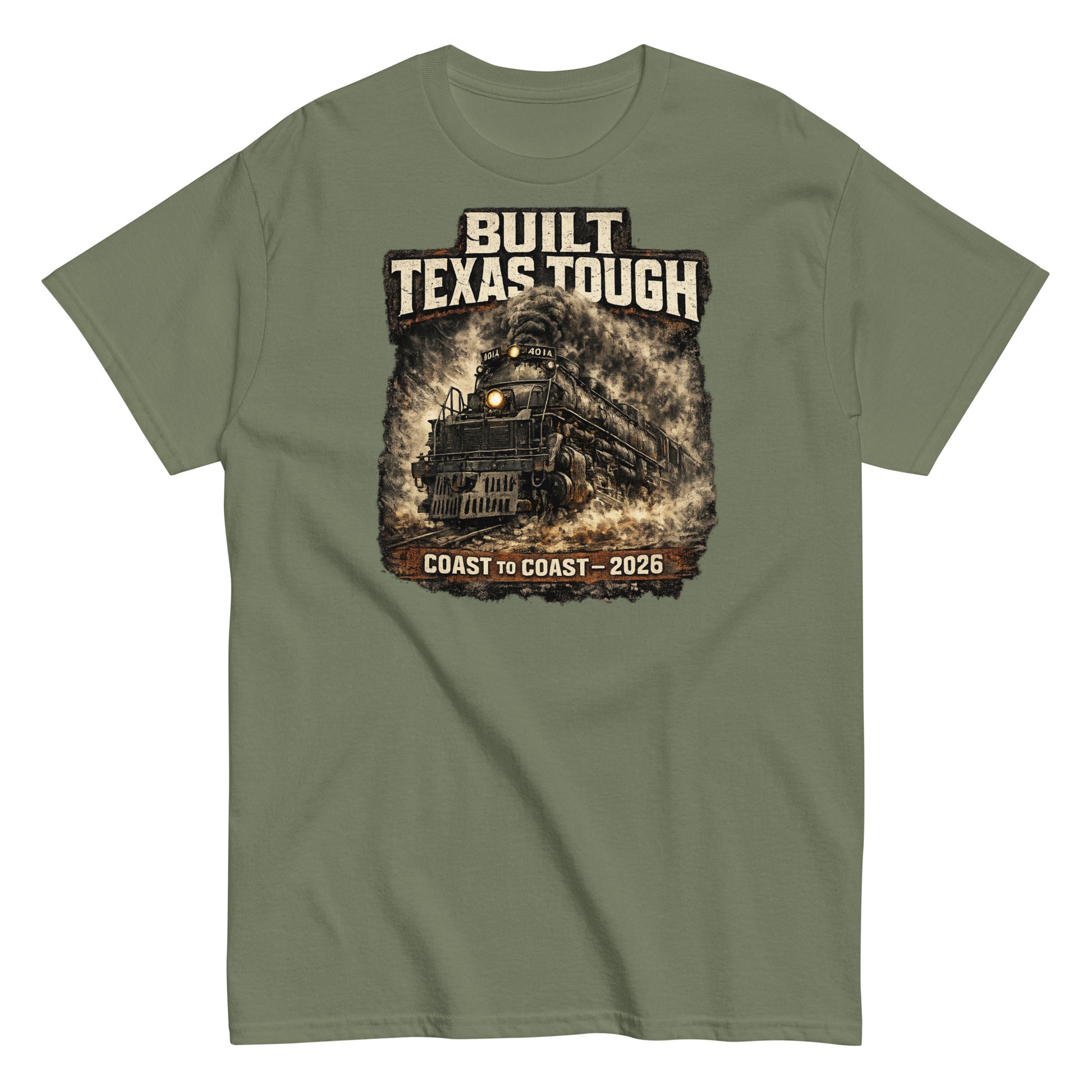 Army green t-shirt featuring a gritty, cinematic graphic of the Big Boy 4014 steam locomotive emerging from thick smoke with text reading "Built Texas Tough" and "Coast to Coast - 2026".