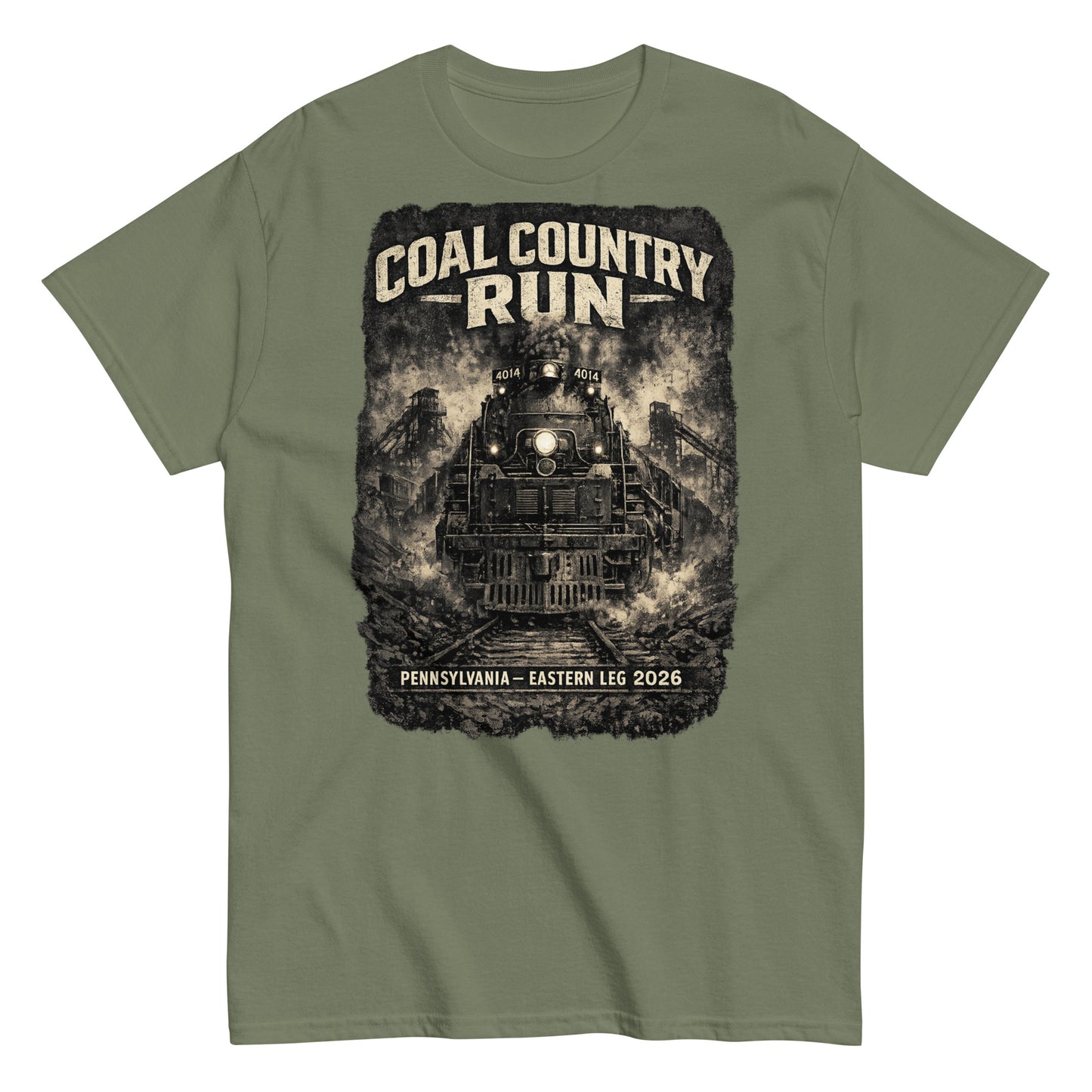 Army green t-shirt featuring a dark, gritty graphic of the Big Boy 4014 steam locomotive passing historic coal mine structures, with text reading "Coal Country Run" and "Pennsylvania - Eastern Leg 2026".