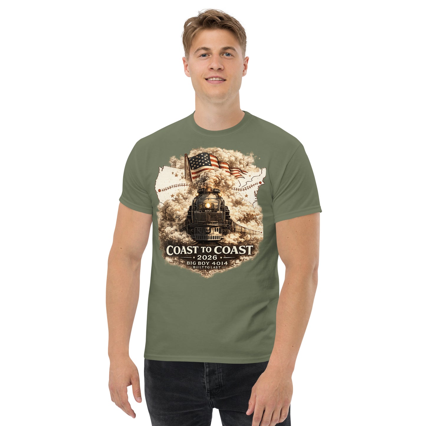 Army green t-shirt featuring the Big Boy 4014 steam locomotive, a waving American flag, and a US map showing a track route, with text reading "Coast to Coast 2026", "Big Boy 4014", and "Built To Last".