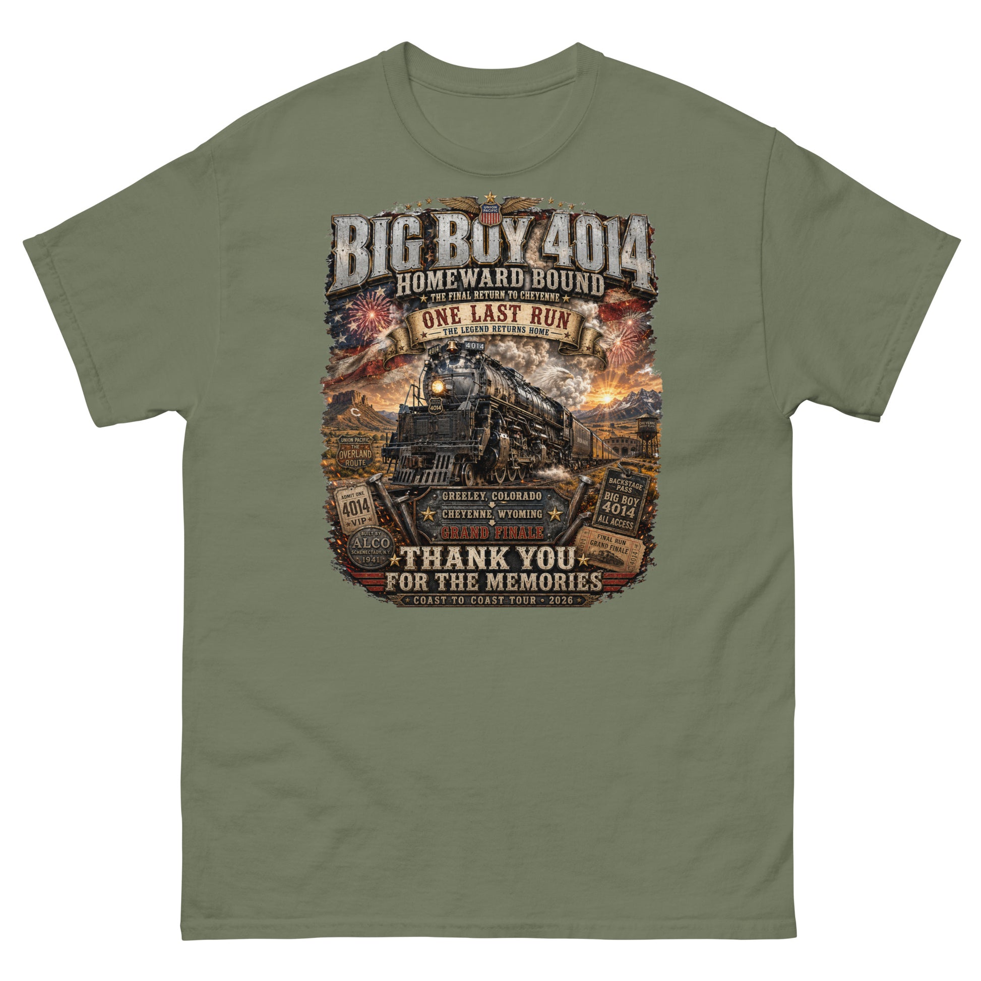 Army green t-shirt featuring an intricate graphic of the Big Boy 4014 steam locomotive charging through a western landscape with a sunset and fireworks in the sky. Text reads "BIG BOY 4014", "HOMEWARD BOUND", "THE FINAL RETURN TO CHEYENNE", "ONE LAST RUN", and "THANK YOU FOR THE MEMORIES". The design includes vintage ticket stubs and lists Greeley, Colorado and Cheyenne, Wyoming for the Grand Finale of the Coast to Coast Tour 2026.