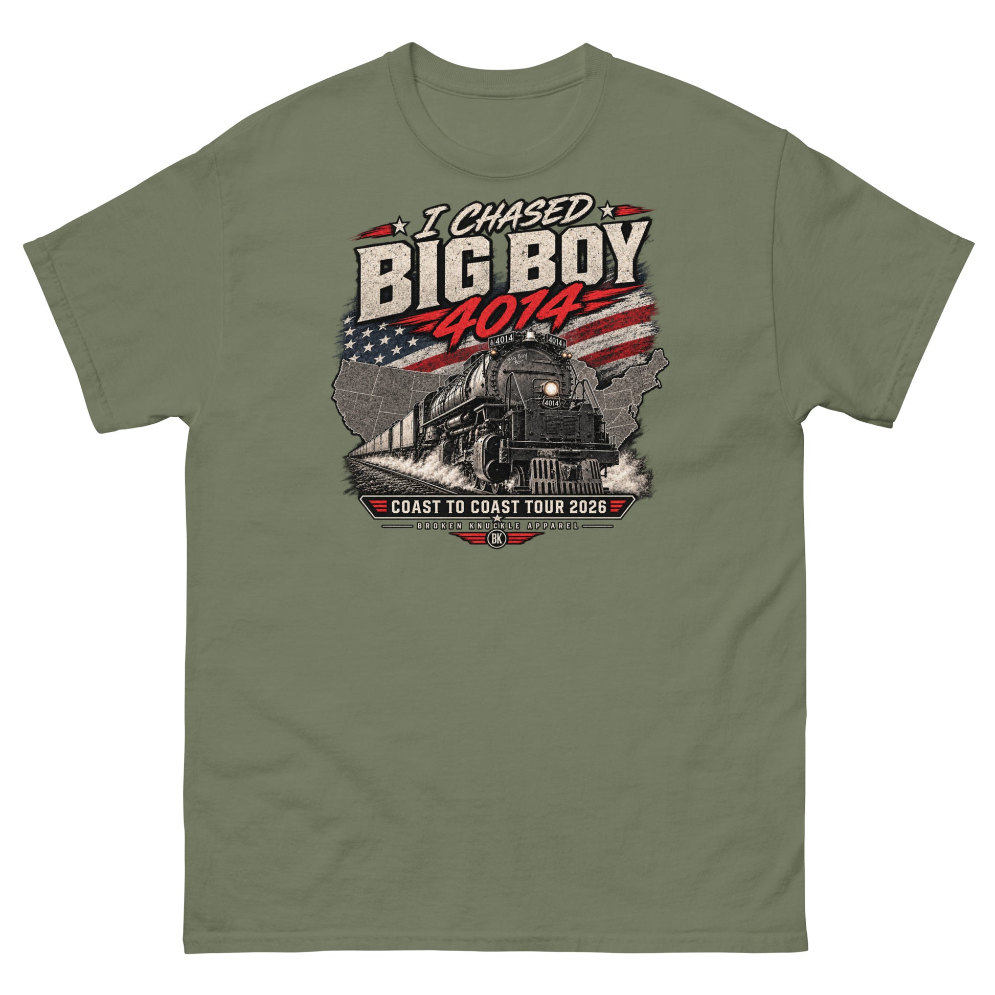 Army green classic t-shirt featuring a graphic of the Big Boy 4014 steam locomotive charging out of a USA map filled with the American flag. Distressed text reads "I CHASED BIG BOY 4014" at the top and "COAST TO COAST TOUR 2026" on a banner at the bottom above the Broken Knuckle Apparel logo.