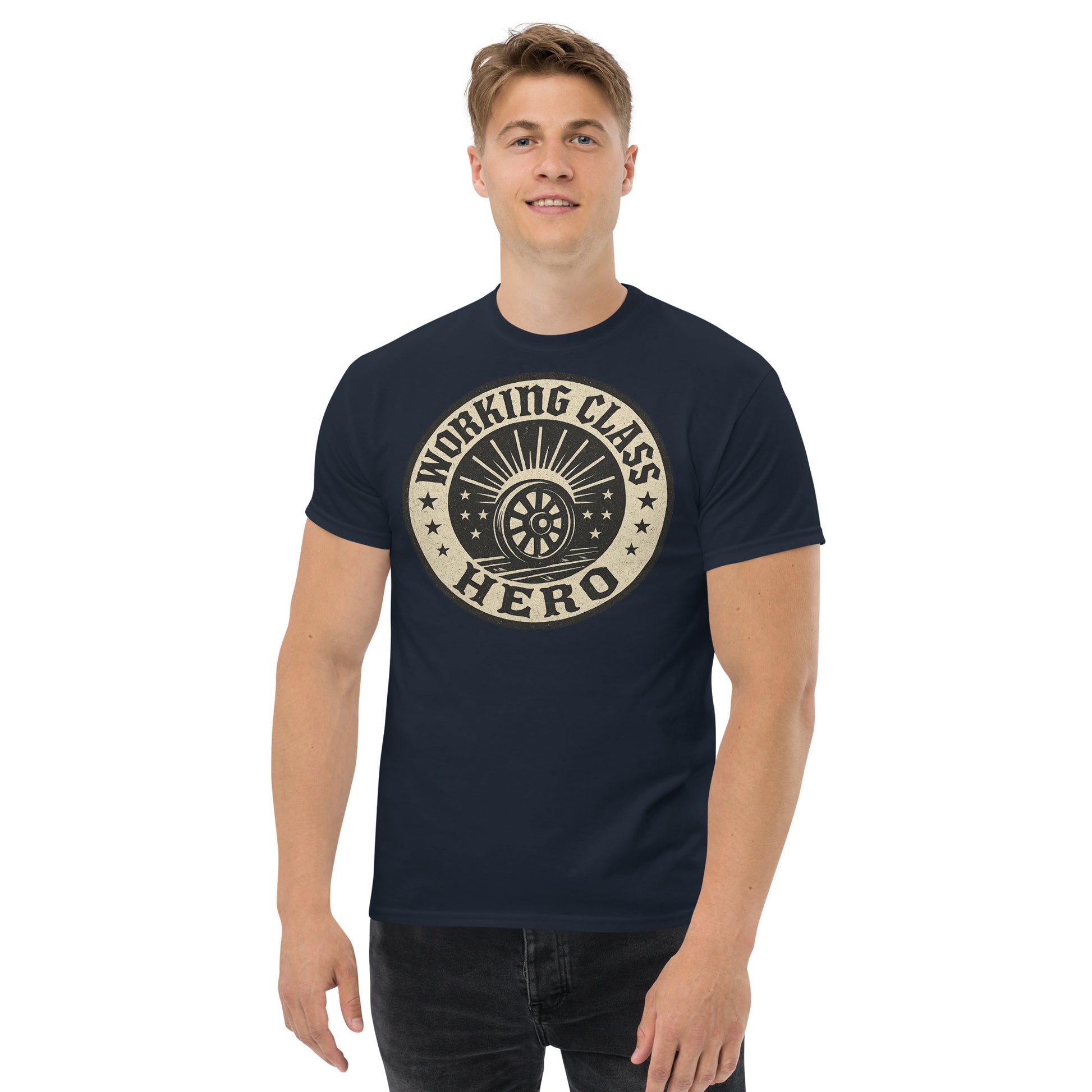 Man wearing a navy blue t-shirt with 'Working Class Hero' graphic design on a white background