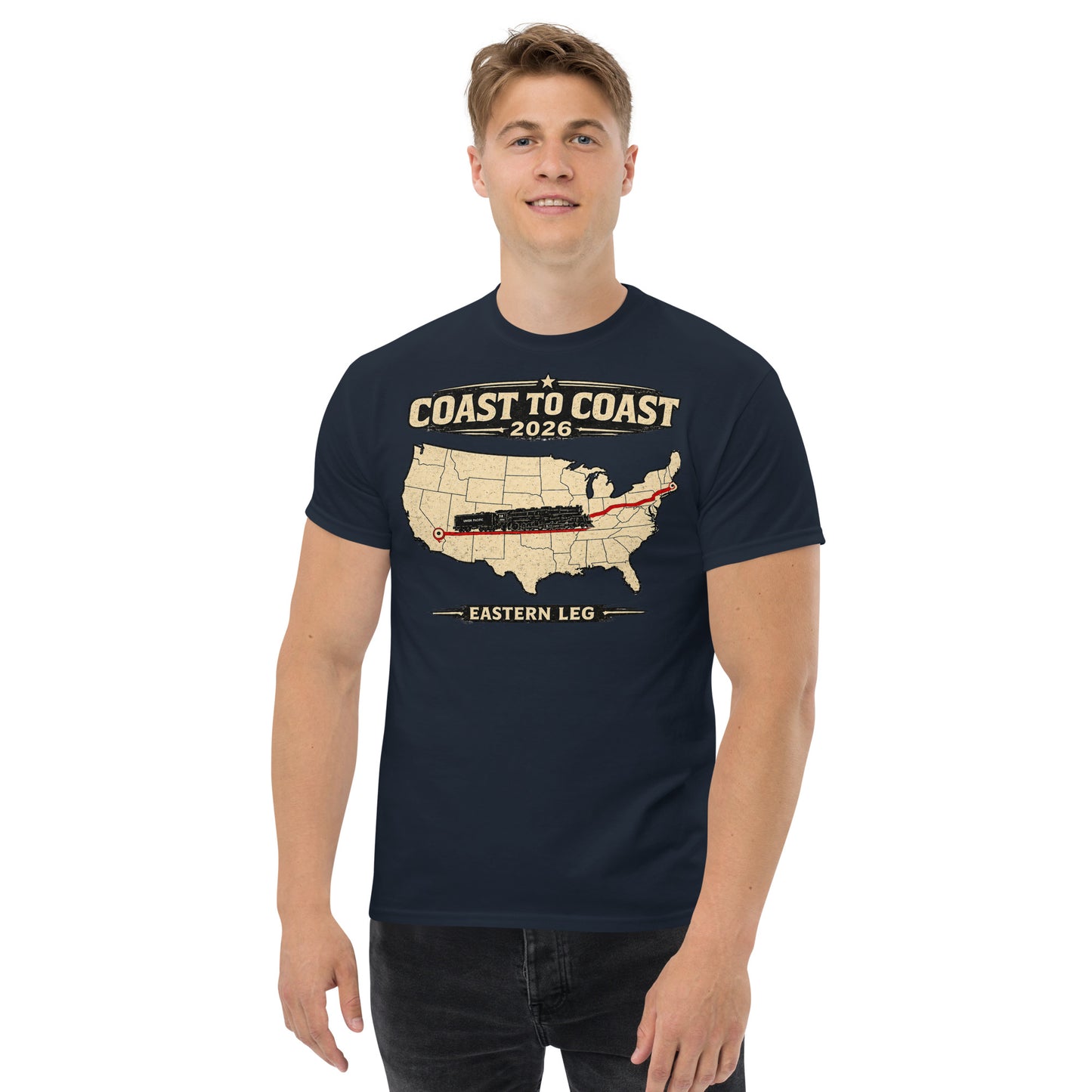 Man wearing a navy blue t-shirt with a map design and text on a white background