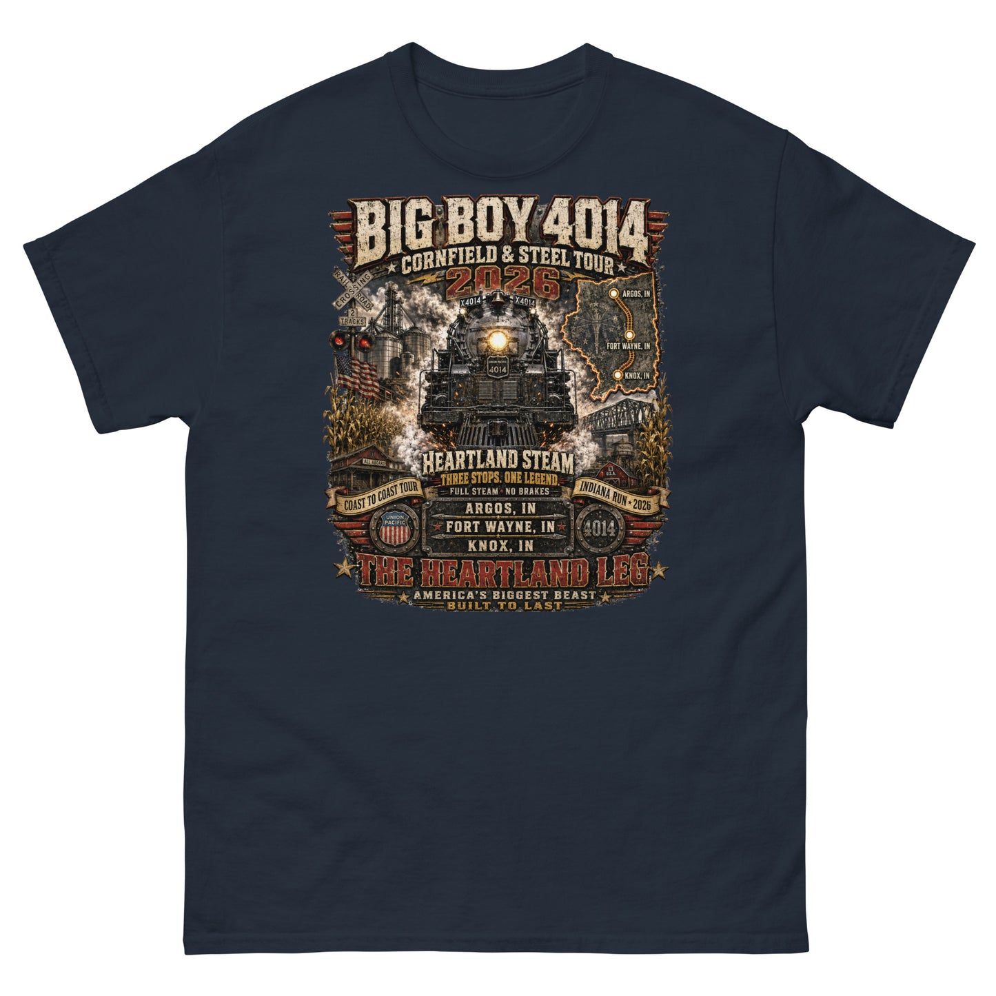 Black t-shirt featuring a highly detailed graphic of the Big Boy 4014 steam locomotive surrounded by cornfields, grain silos, and a steel bridge. Text reads "BIG BOY 4014", "CORNFIELD & STEEL TOUR 2026", "HEARTLAND STEAM", alongside banners for "COAST TO COAST TOUR" and "INDIANA RUN - 2026", plus a map and detailed roster of three Indiana tour stops: Argos, IN; Fort Wayne, IN; and Knox, IN above the text "THE HEARTLAND LEG".