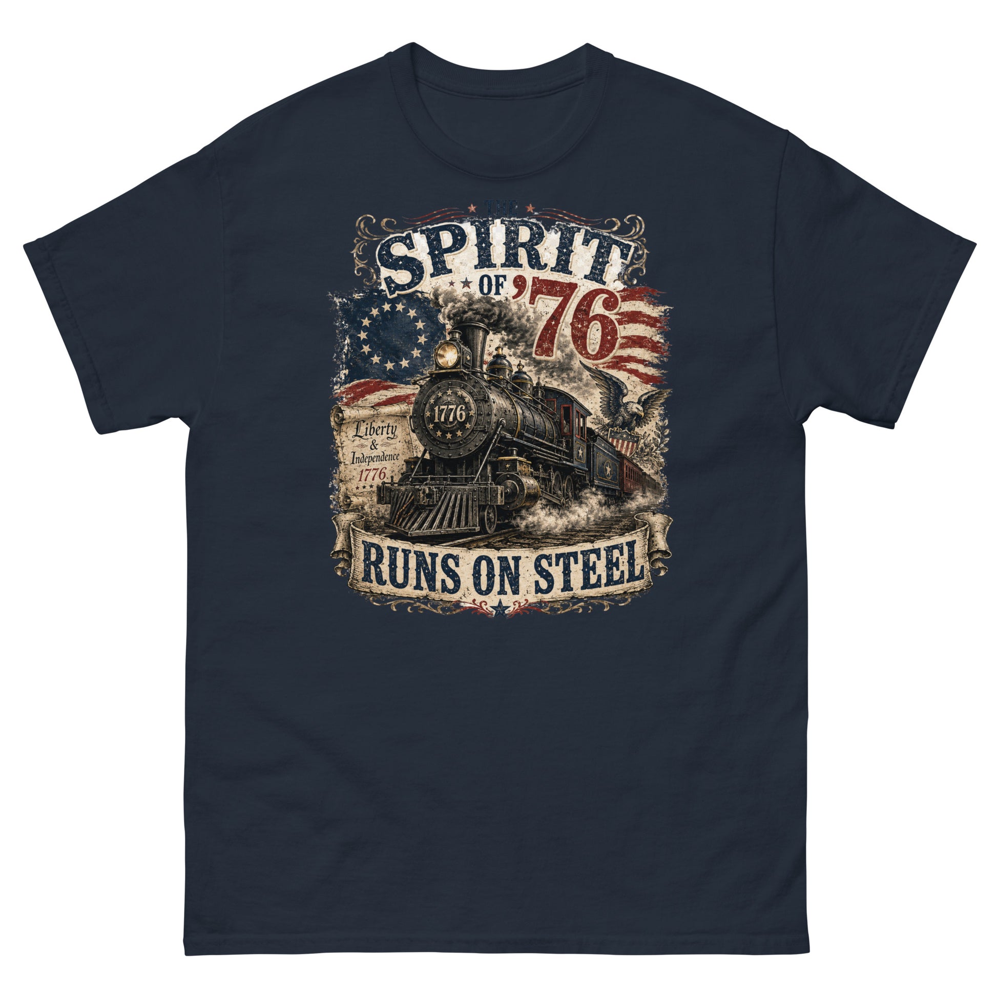 Navy t-shirt featuring a highly detailed vintage graphic. At the top, distressed text reads "THE SPIRIT OF '76". The center shows a classic steam locomotive with "1776" on the front plate, bursting from a 13-star Betsy Ross American flag. A bald eagle flies on the right, and a parchment scroll on the left reads "Liberty & Independence 1776". A banner at the bottom reads "RUNS ON STEEL".