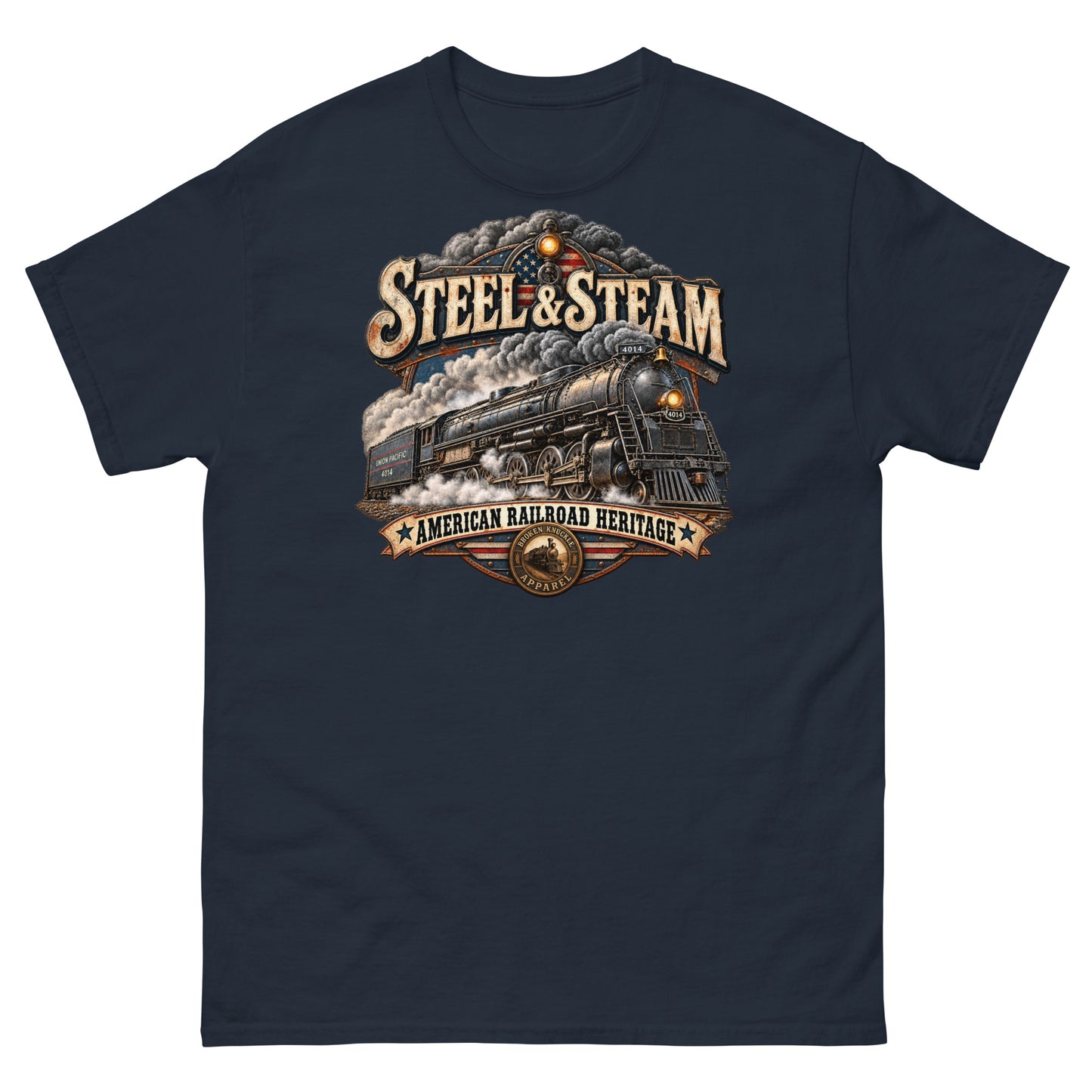 Navy classic t-shirt featuring a highly detailed vintage graphic. A steam locomotive charges forward surrounded by smoke, with an American flag motif in the background. Vintage distressed text reads "STEEL & STEAM" at the top and "AMERICAN RAILROAD HERITAGE" on a banner at the bottom, just above a round Broken Knuckle Apparel badge.