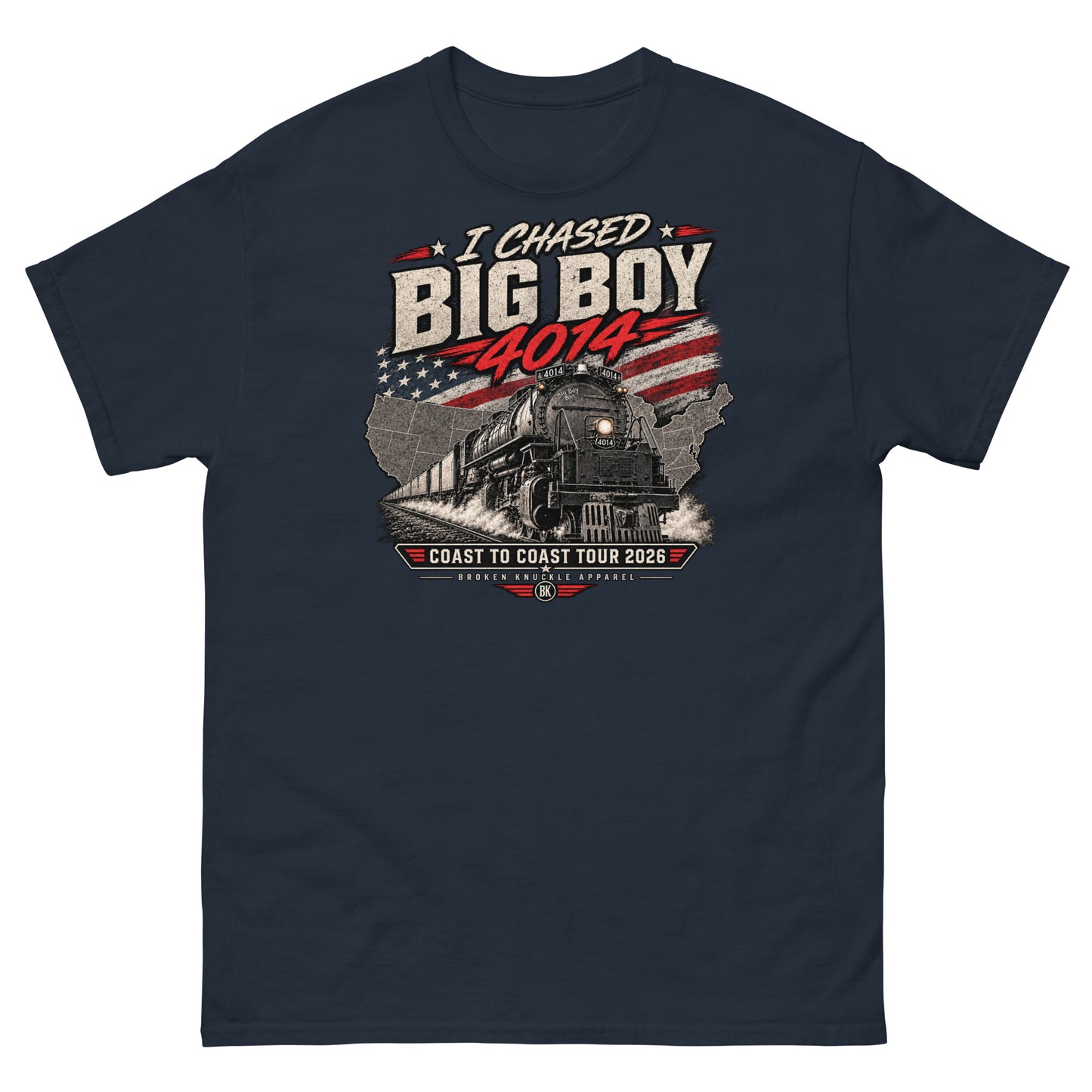 Navy classic t-shirt featuring a graphic of the Big Boy 4014 steam locomotive charging out of a USA map filled with the American flag. Distressed text reads "I CHASED BIG BOY 4014" at the top and "COAST TO COAST TOUR 2026" on a banner at the bottom above the Broken Knuckle Apparel logo.