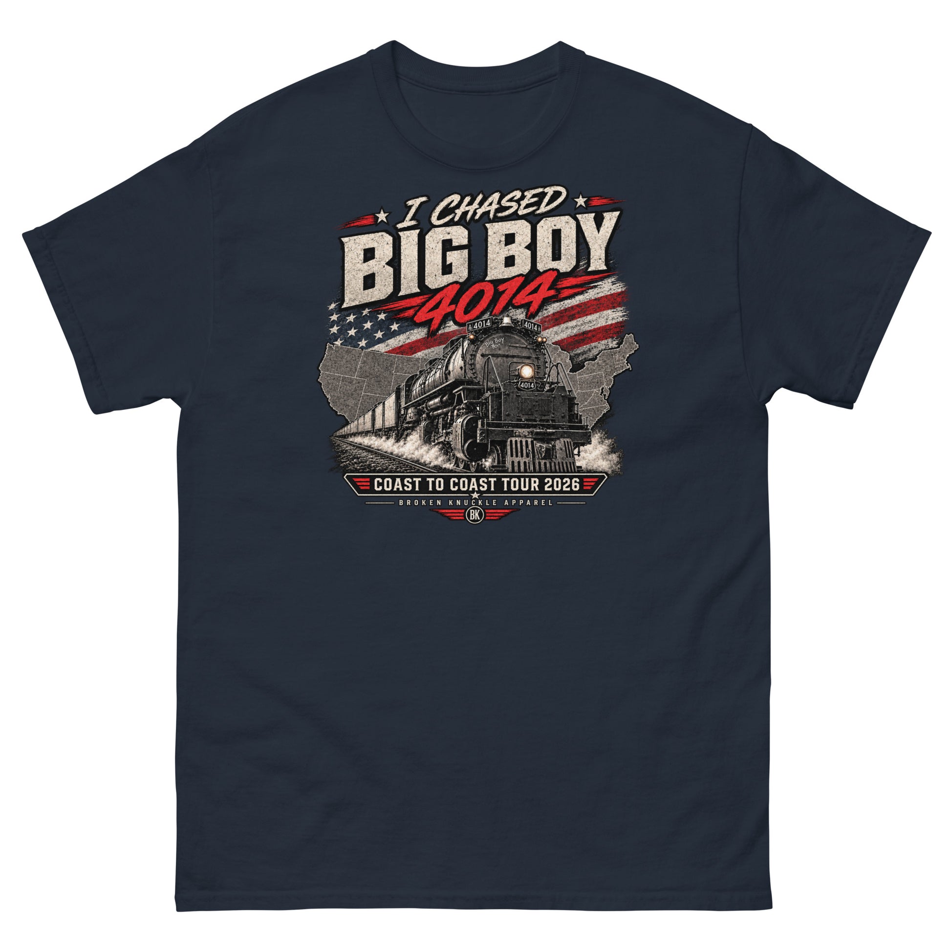 Navy classic t-shirt featuring a graphic of the Big Boy 4014 steam locomotive charging out of a USA map filled with the American flag. Distressed text reads "I CHASED BIG BOY 4014" at the top and "COAST TO COAST TOUR 2026" on a banner at the bottom above the Broken Knuckle Apparel logo.