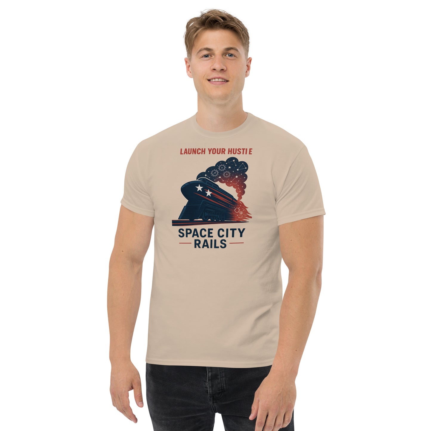Man wearing a beige t-shirt with 'Space City Rails' graphic design on a white background