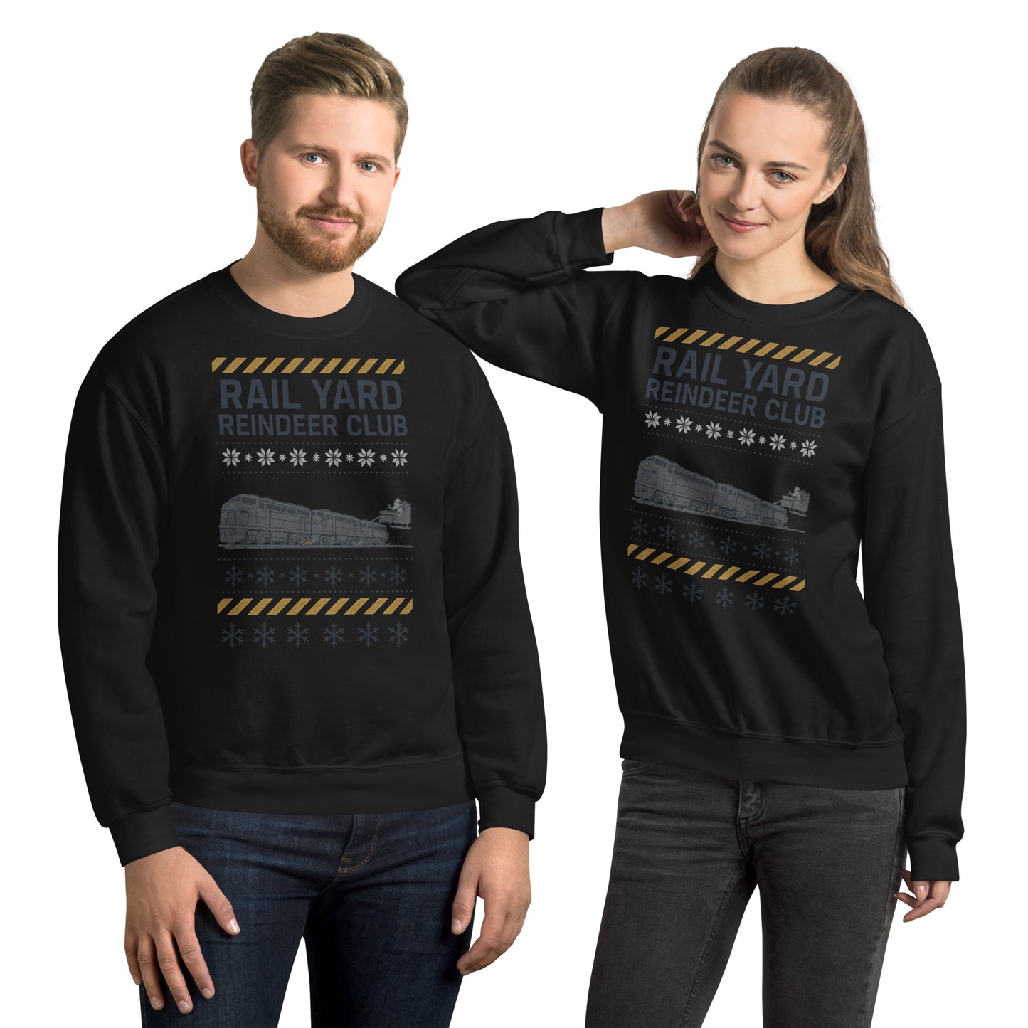 Two people wearing black sweatshirts with 'Rail Yard Reindeer Club' text and graphic design.