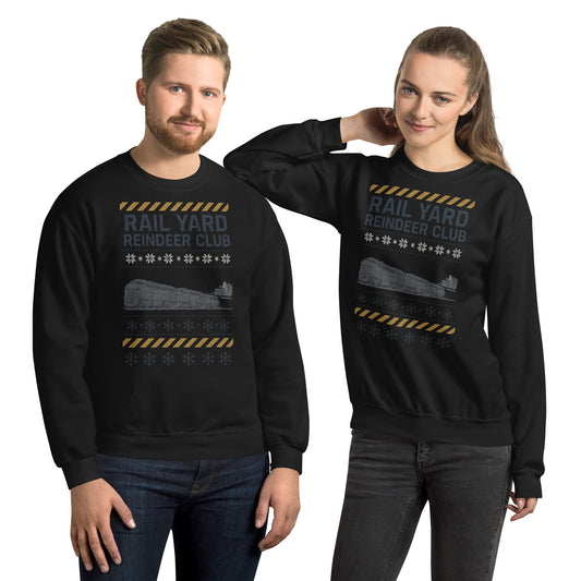 Two people wearing black sweatshirts with 'Rail Yard Reindeer Club' text and graphic design.
