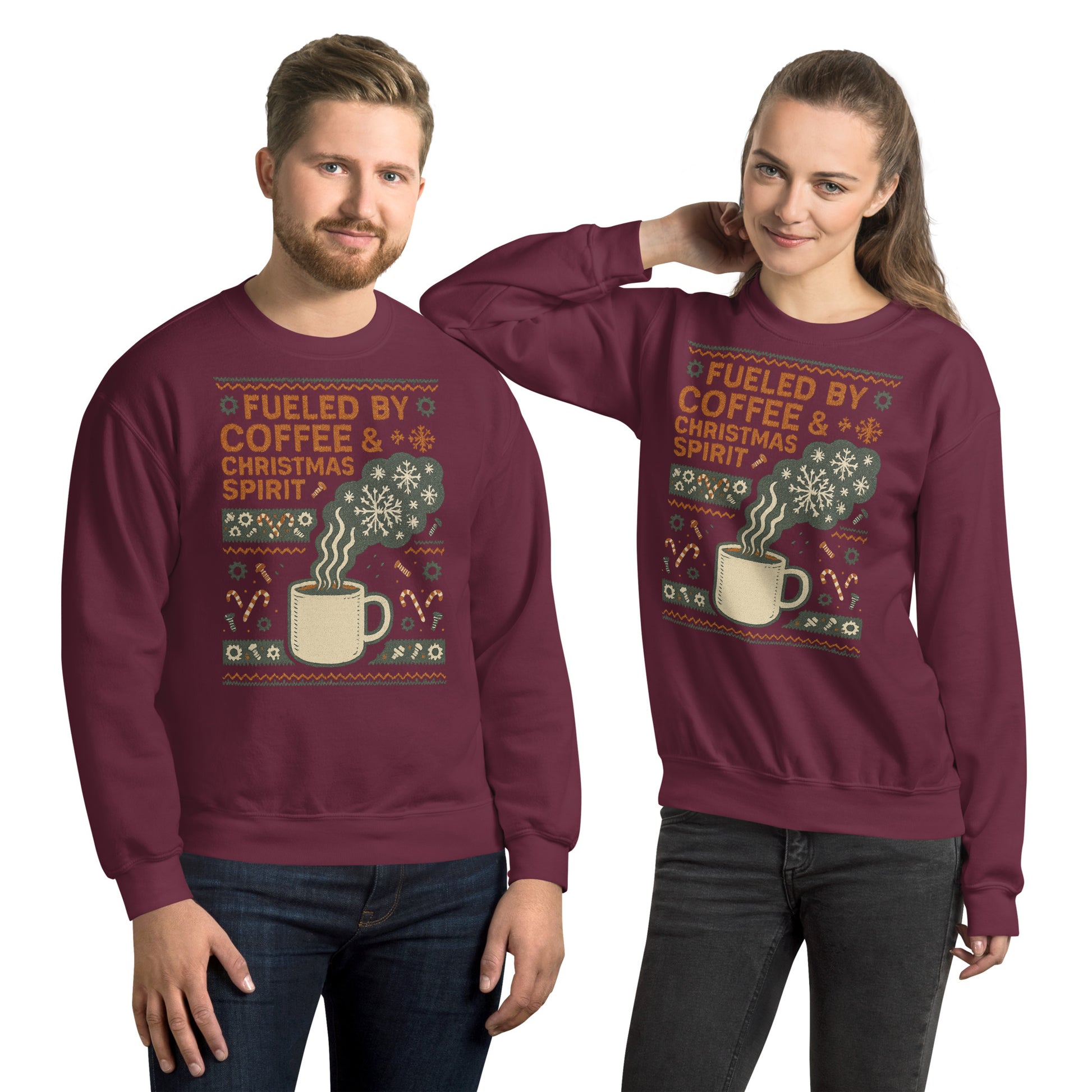 Two people wearing maroon sweatshirts with Christmas-themed designs and text.