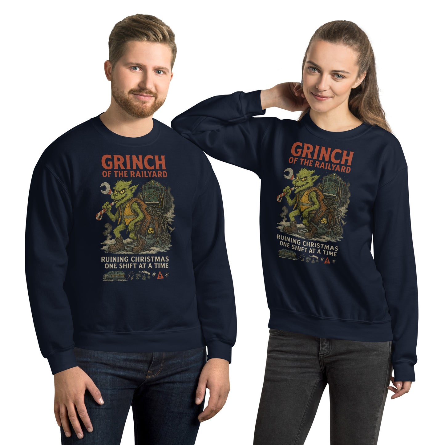 Two people wearing navy blue sweatshirts with a Grinch graphic and text.