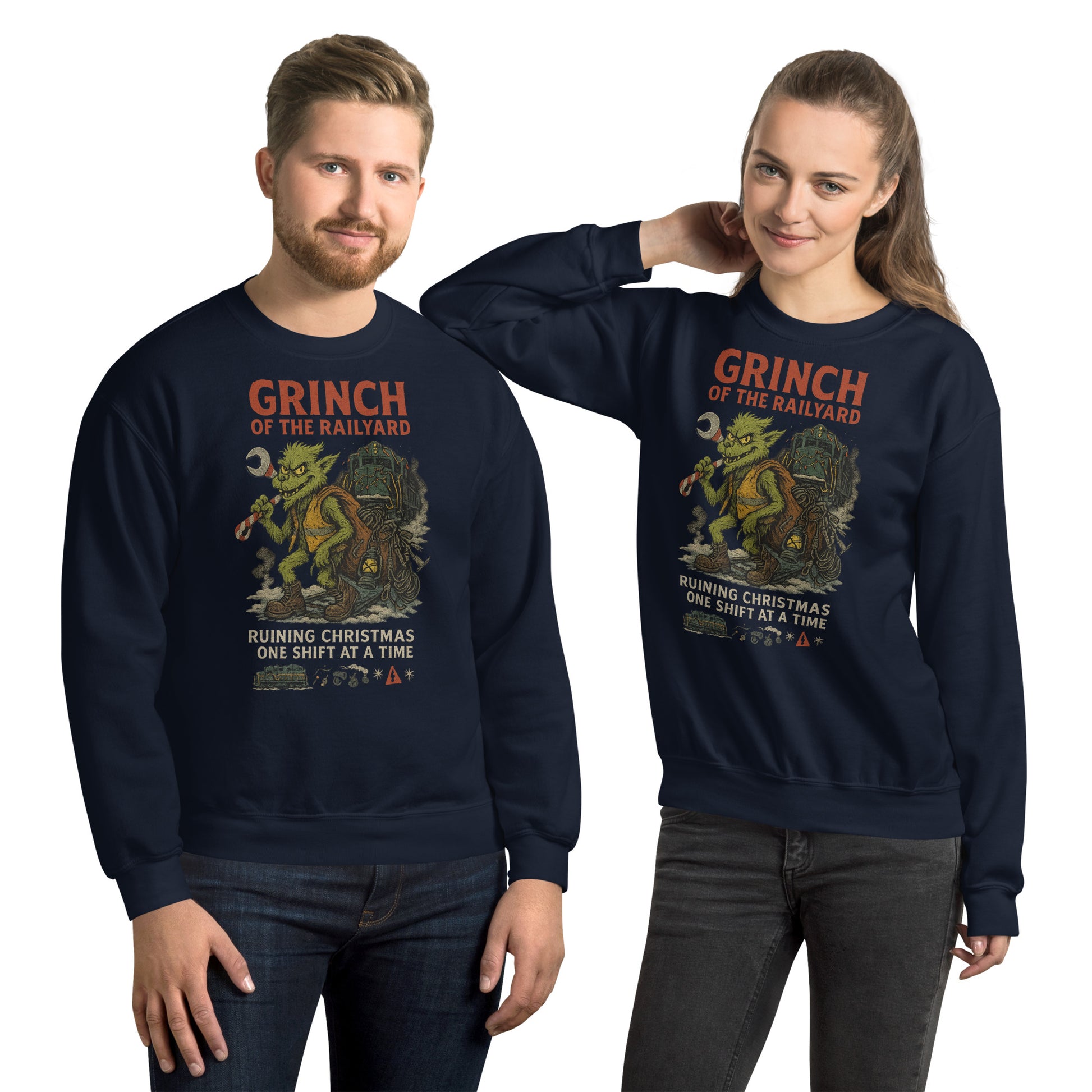 Two people wearing navy blue sweatshirts with a Grinch graphic and text.
