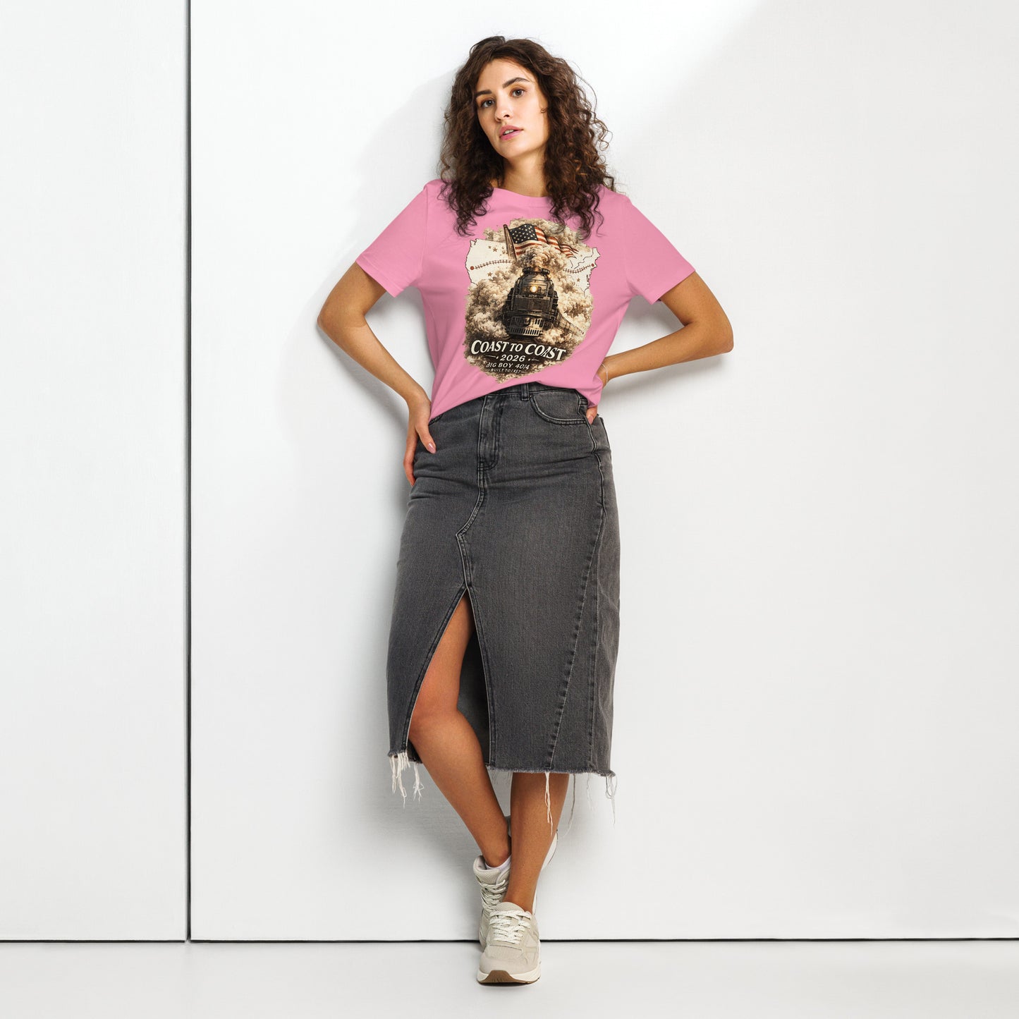 Women's pink organic t-shirt featuring the Big Boy 4014 steam locomotive, a waving American flag, and a US map showing a track route, with text reading "Coast to Coast 2026", "Big Boy 4014", and "Built To Last".
