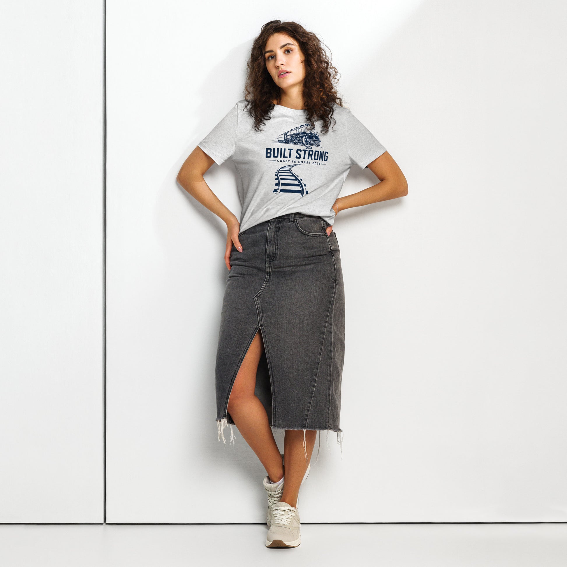 gray women's t-shirt featuring a sleek, dark line-art graphic of the Big Boy 4014 steam locomotive on curving tracks, with text reading "Built Strong" and "Coast to Coast 2026".