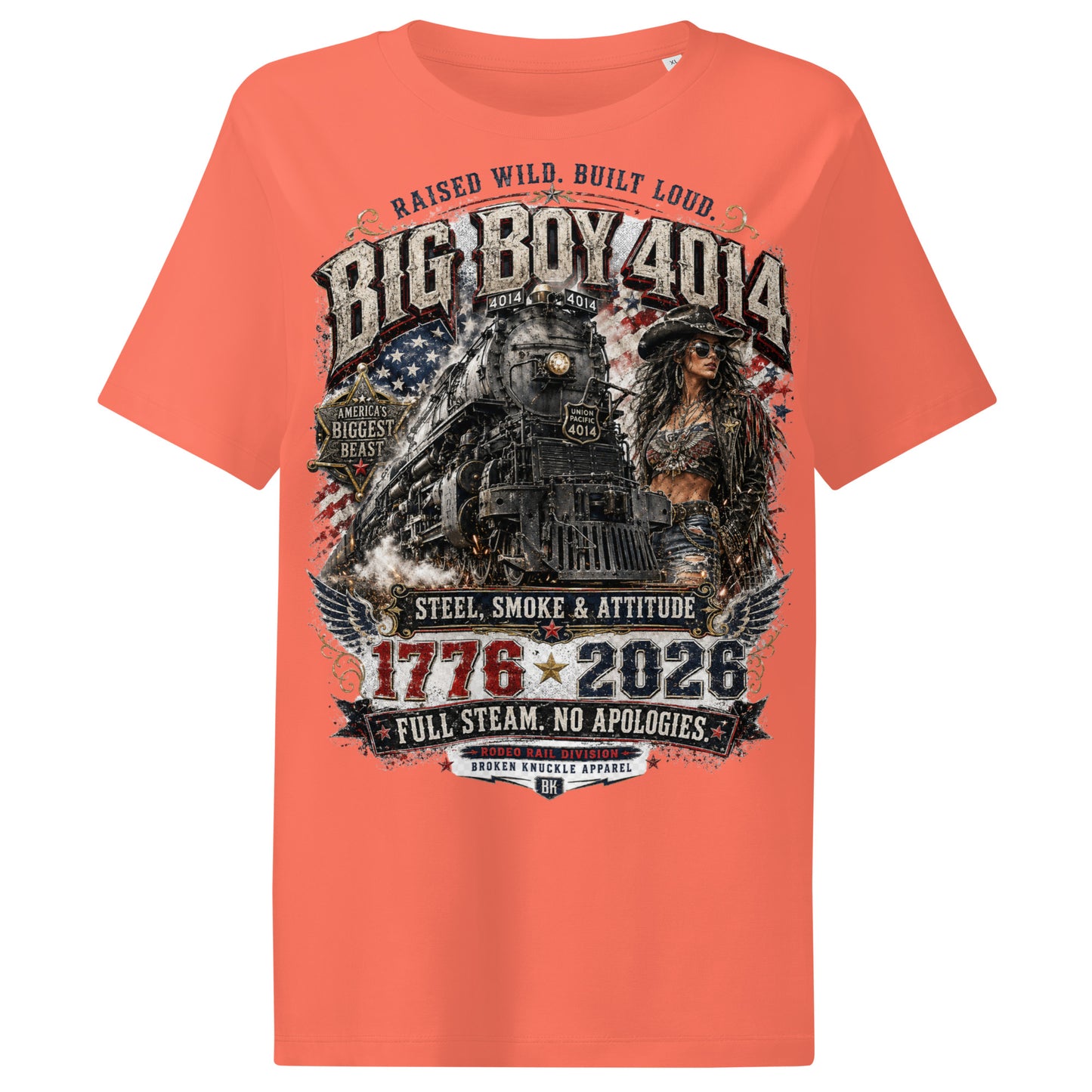 Orange women's ribbed neck t-shirt featuring a gritty graphic of the Big Boy 4014 steam locomotive next to a woman in a cowboy hat and leather jacket. The background includes a distressed American flag and eagle wings. Text reads "RAISED WILD. BUILT LOUD.", "BIG BOY 4014", "AMERICA'S BIGGEST BEAST", "STEEL, SMOKE & ATTITUDE", "1776 - 2026", "FULL STEAM. NO APOLOGIES.", and "RODEO RAIL DIVISION".