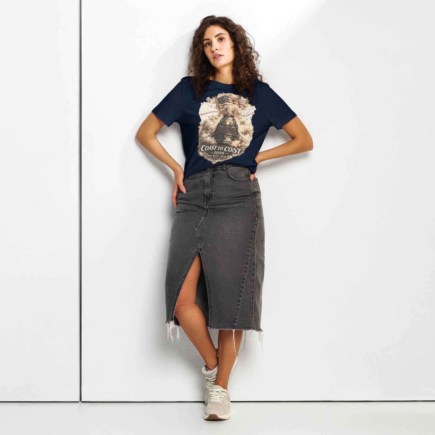 Women's navy organic t-shirt featuring the Big Boy 4014 steam locomotive, a waving American flag, and a US map showing a track route, with text reading "Coast to Coast 2026", "Big Boy 4014", and "Built To Last".