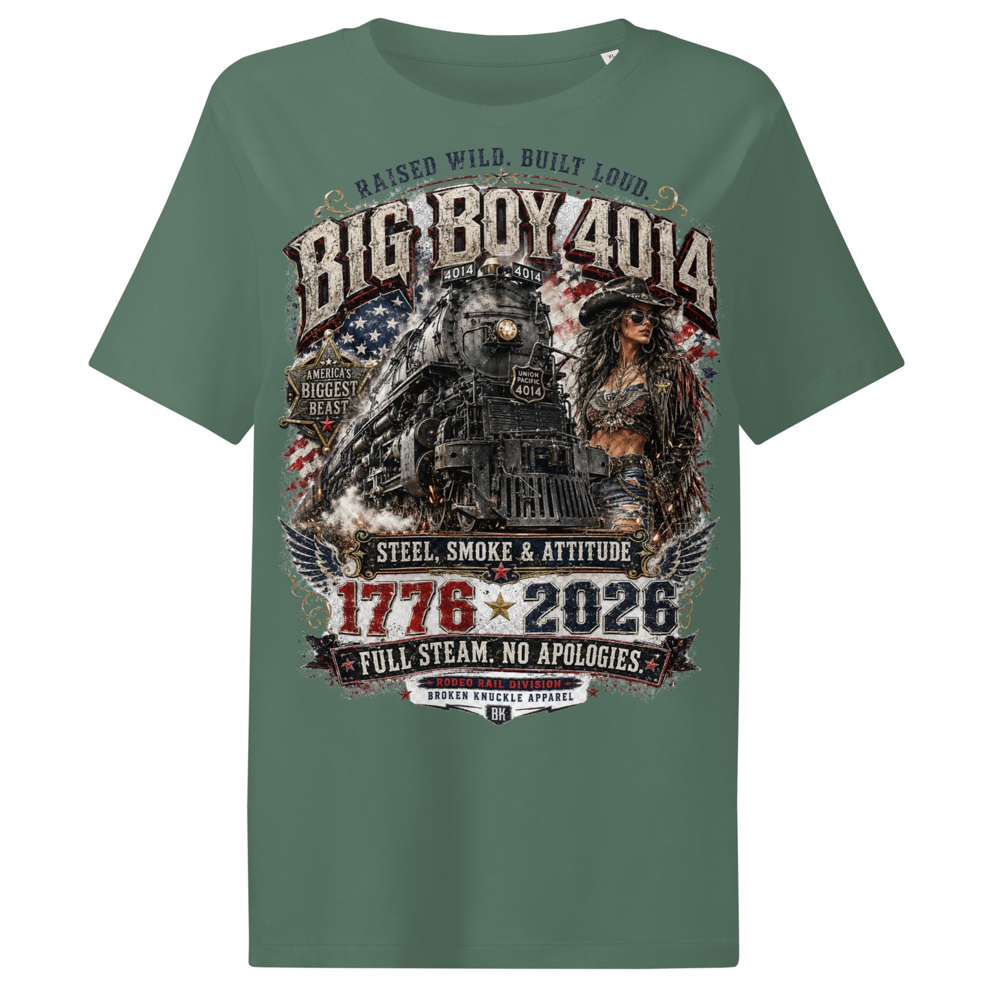 Green women's ribbed neck t-shirt featuring a gritty graphic of the Big Boy 4014 steam locomotive next to a woman in a cowboy hat and leather jacket. The background includes a distressed American flag and eagle wings. Text reads "RAISED WILD. BUILT LOUD.", "BIG BOY 4014", "AMERICA'S BIGGEST BEAST", "STEEL, SMOKE & ATTITUDE", "1776 - 2026", "FULL STEAM. NO APOLOGIES.", and "RODEO RAIL DIVISION".