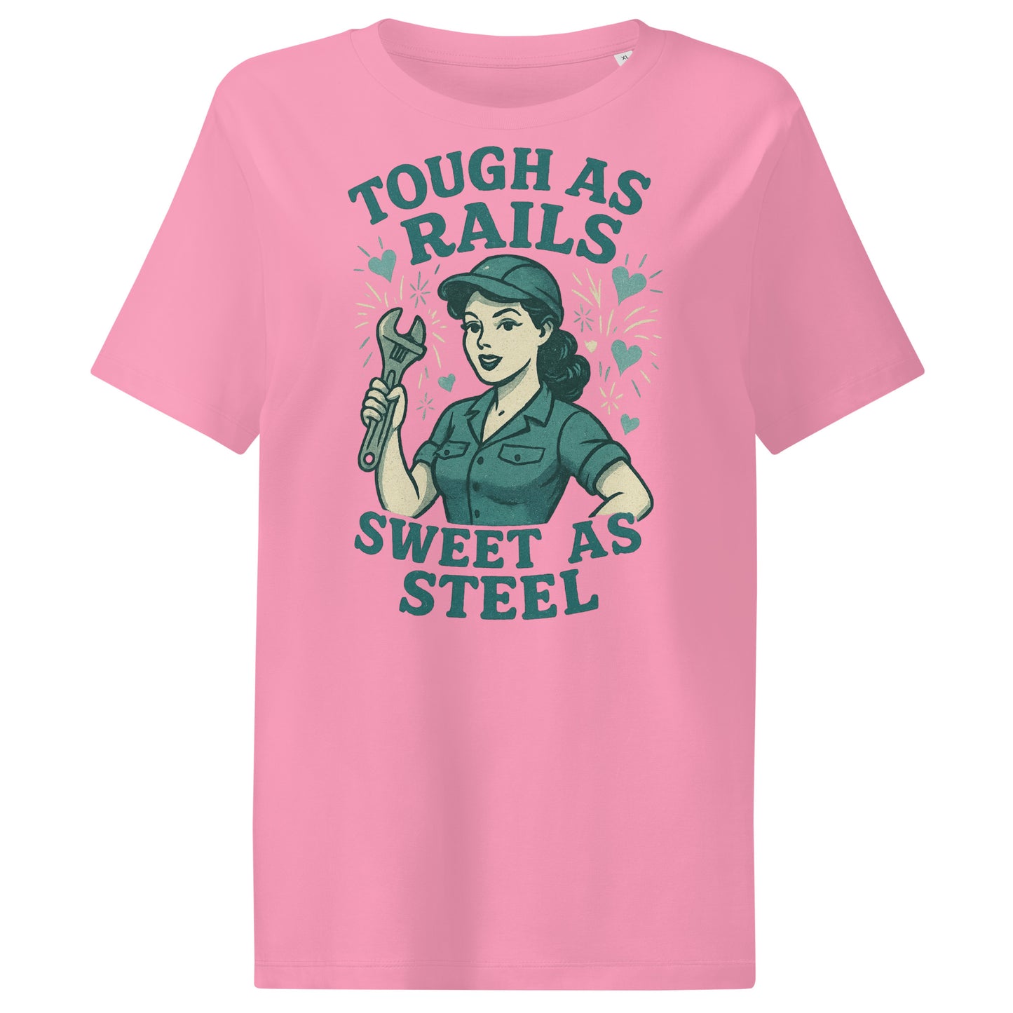 Pink t-shirt with graphic design of a woman holding a wrench and text 'Tough as Rails, Sweet as Steel' on a white background.