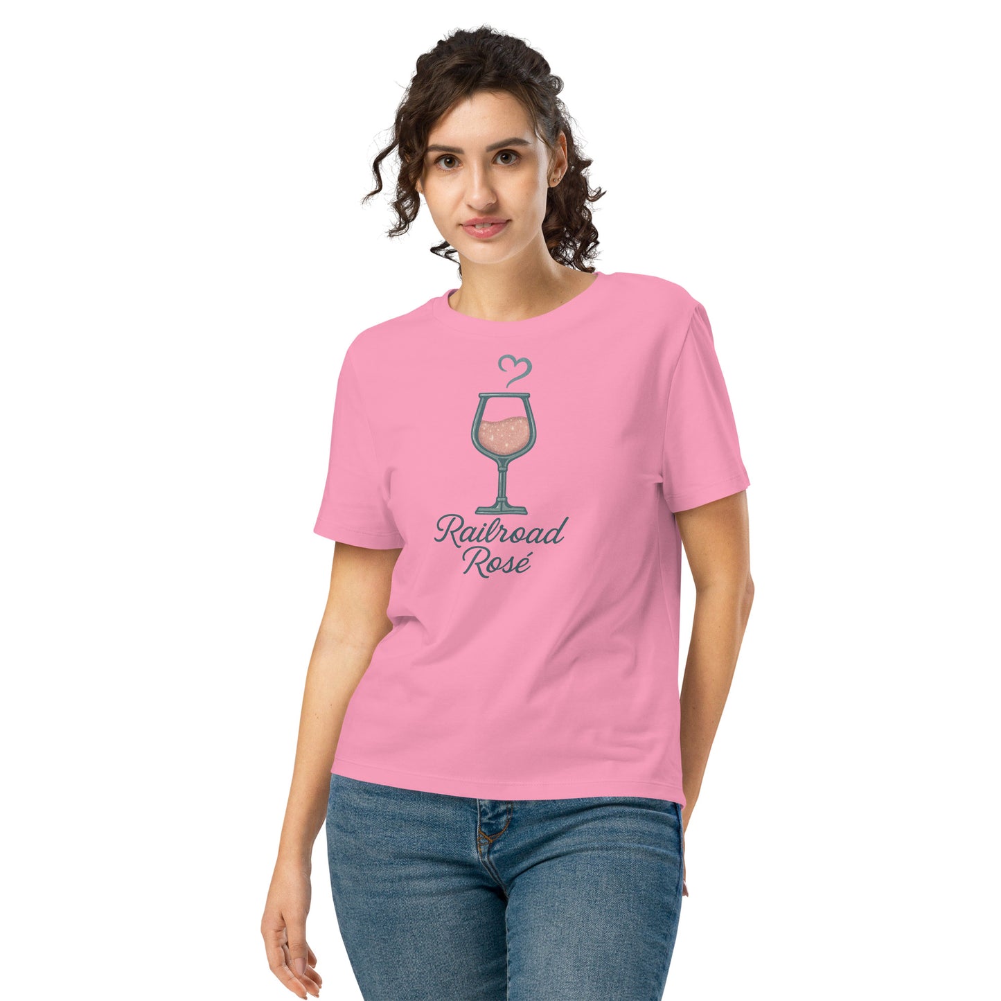 Woman wearing a pink t-shirt with 'Railroad Rose' design on a white background