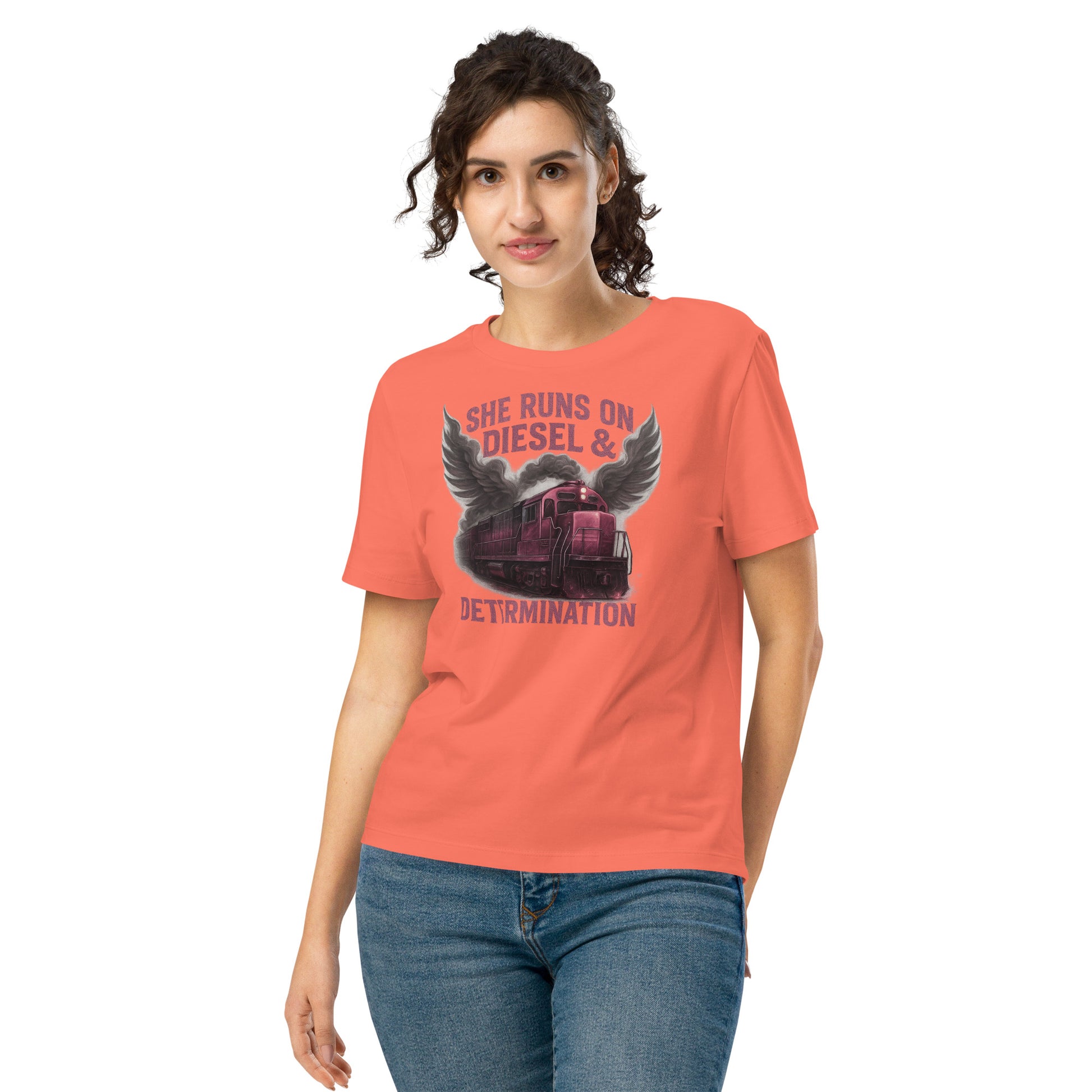 Woman wearing a coral t-shirt with a graphic design and text on a white background