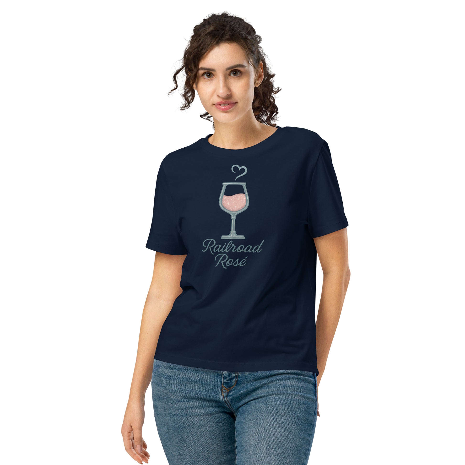 Woman wearing a navy blue t-shirt with 'Railroad Rose' design on a white background