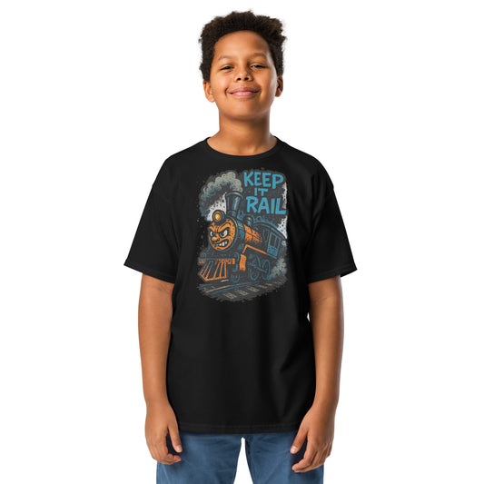 Child wearing a black t-shirt with a train graphic and text on a white background