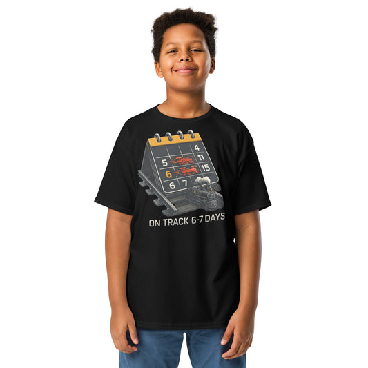 Child wearing a black t-shirt with a graphic design on a white background