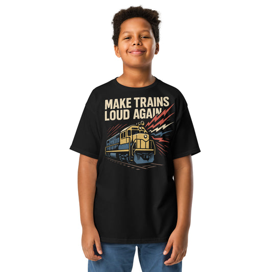 Child wearing a black t-shirt with a train graphic and text on a white background