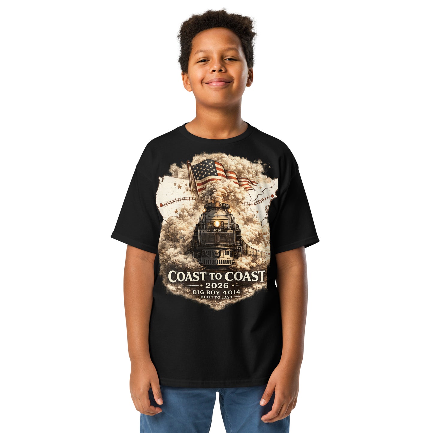 Child wearing a black t-shirt featuring the Big Boy 4014 steam locomotive, a waving American flag, and a US map showing a track route, with text reading "Coast to Coast 2026", "Big Boy 4014", and "Built To Last".