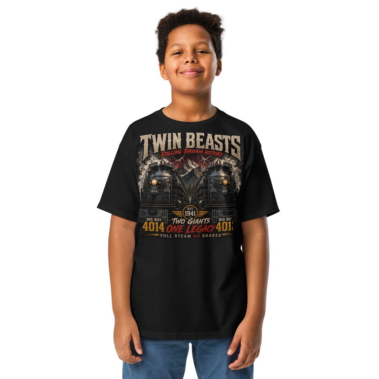Youth black t-shirt featuring a symmetrical graphic of two steam locomotives, Big Boy 4014 on the left and Big Boy 4012 on the right, side-by-side in front of a mountain range with red lightning strikes. Text reads "TWIN BEASTS", "ROLLING THROUGH HISTORY", "EST. 1941", "TWO GIANTS ONE LEGACY", and "FULL STEAM NO BRAKES".
