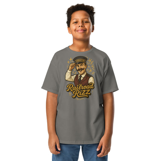 Child wearing a gray t-shirt with a graphic design on a white background