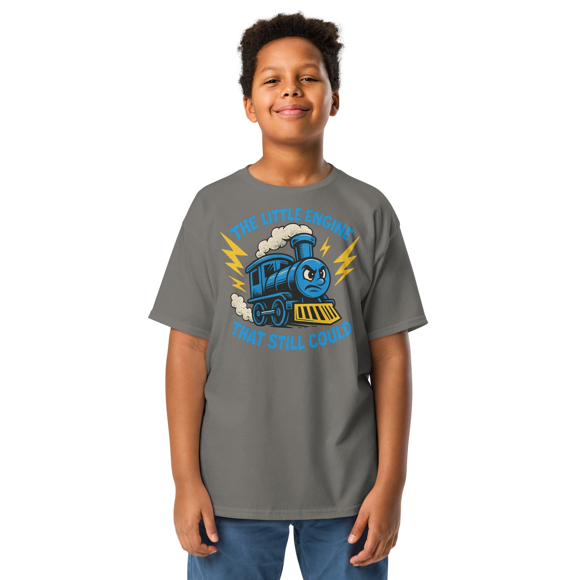 Child wearing a gray t-shirt with a blue train graphic and text on a white background