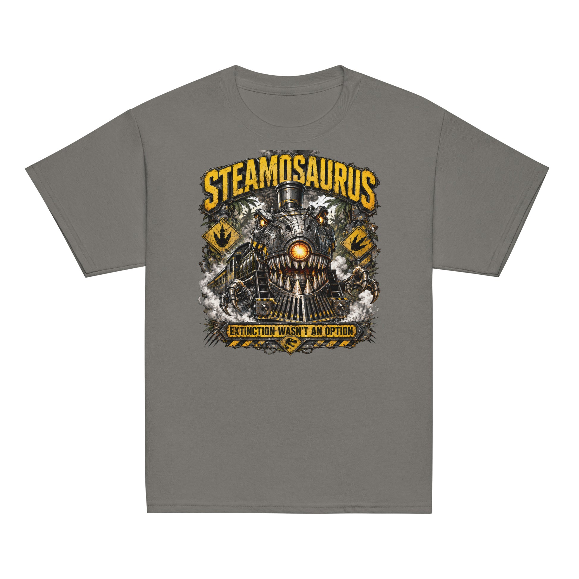 Youth gray t-shirt featuring a graphic that combines a T-Rex dinosaur and a steam locomotive. The monster train has metal teeth, mechanical claws, and a glowing orange headlight. Yellow distressed text reads "STEAMOSAURUS" at the top and "EXTINCTION WASN'T AN OPTION" on a hazard banner at the bottom. The background includes jungle trees and yellow dinosaur footprint caution signs.