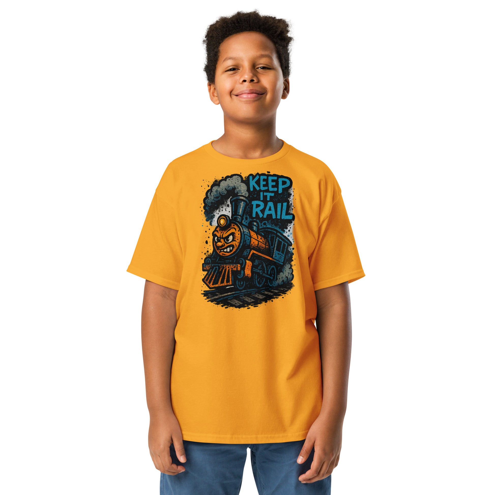 Child wearing a yellow t-shirt with a train graphic and text on a white background