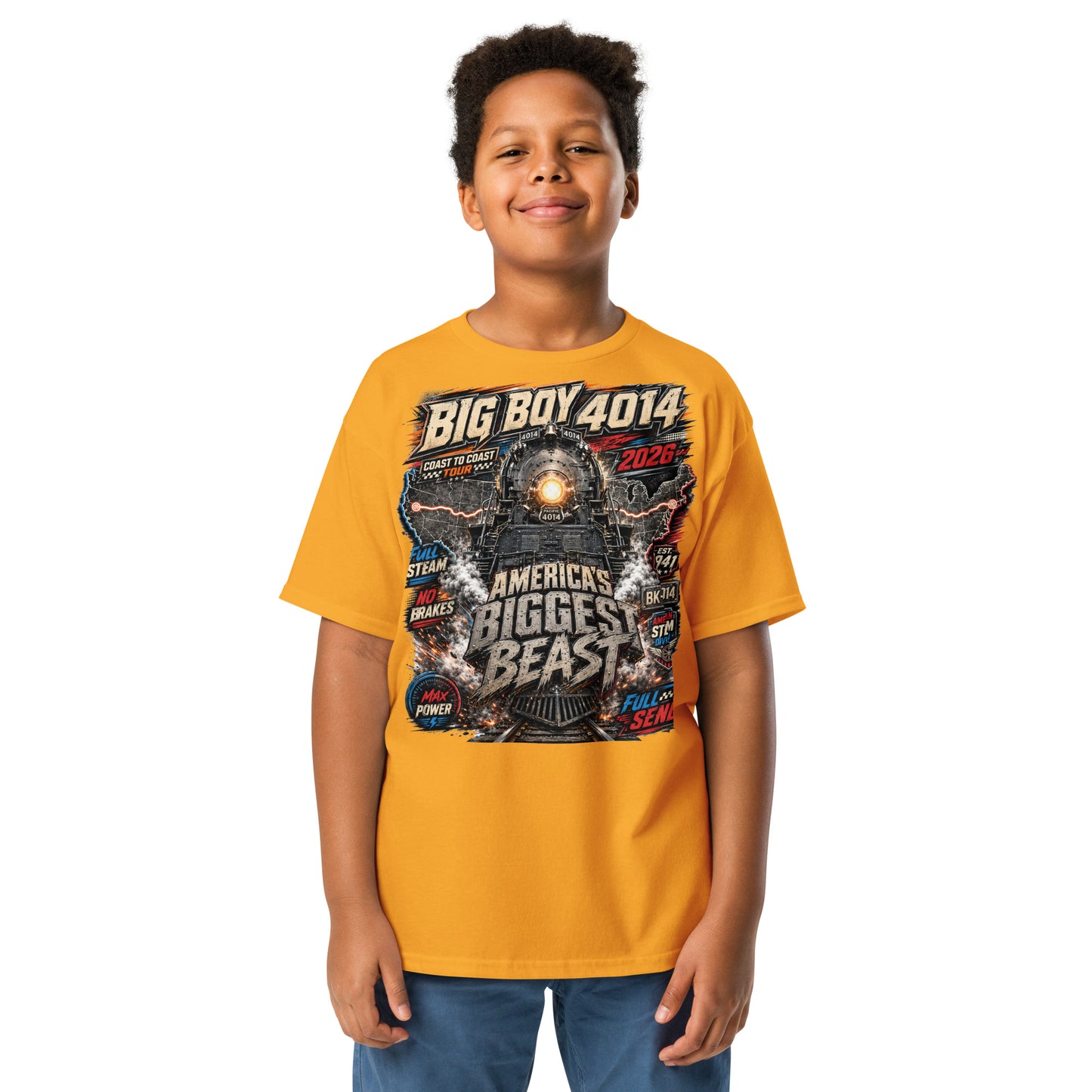 Child wearing a yellow t-shirt featuring a high-energy, colorful graphic of the Big Boy 4014 steam locomotive backed by a US map, with bold text reading "BIG BOY 4014", "COAST TO COAST TOUR 2026", "AMERICA'S BIGGEST BEAST", "FULL STEAM", "NO BRAKES", "MAX POWER", and "FULL SEND".