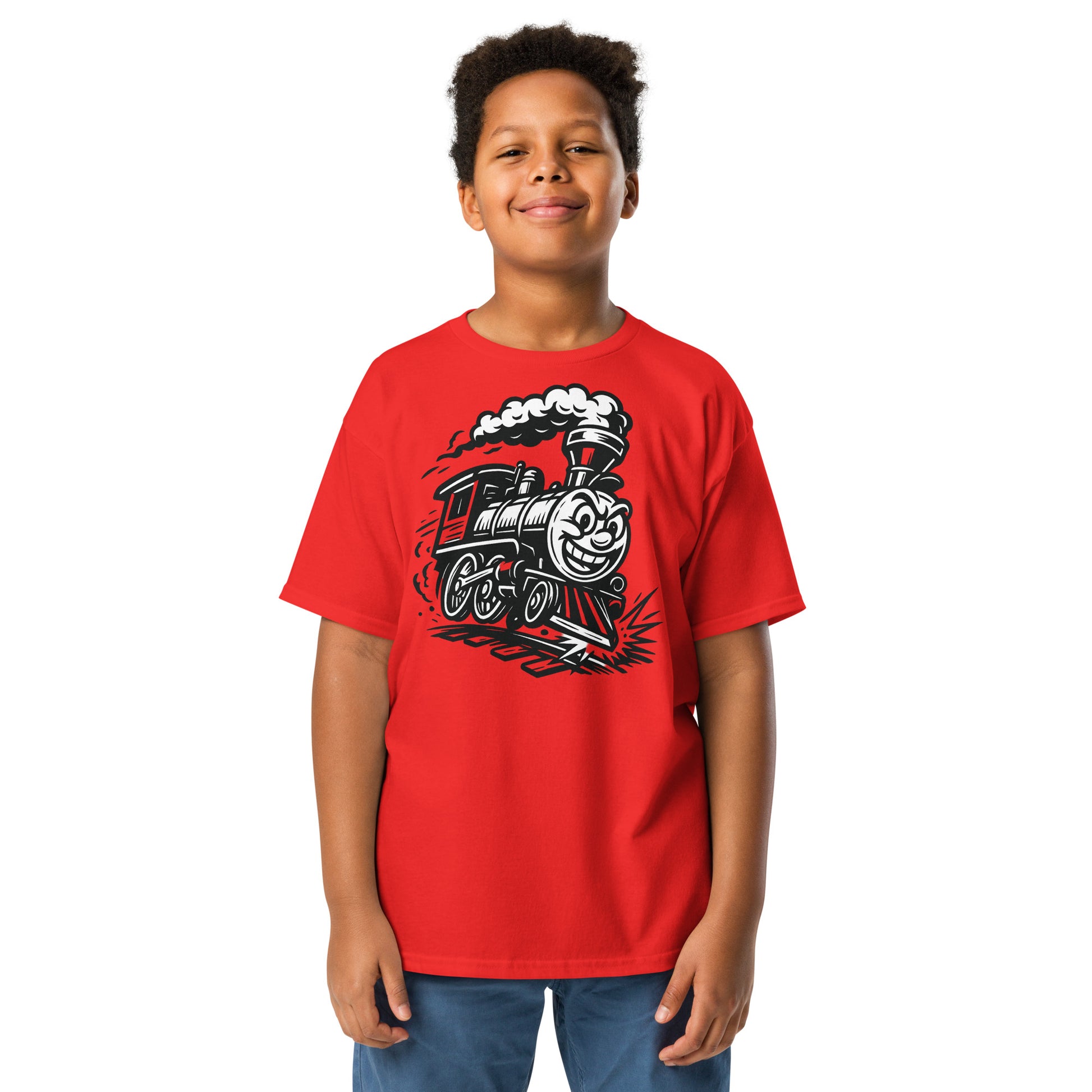 Child wearing a red t-shirt with a train graphic on a white background