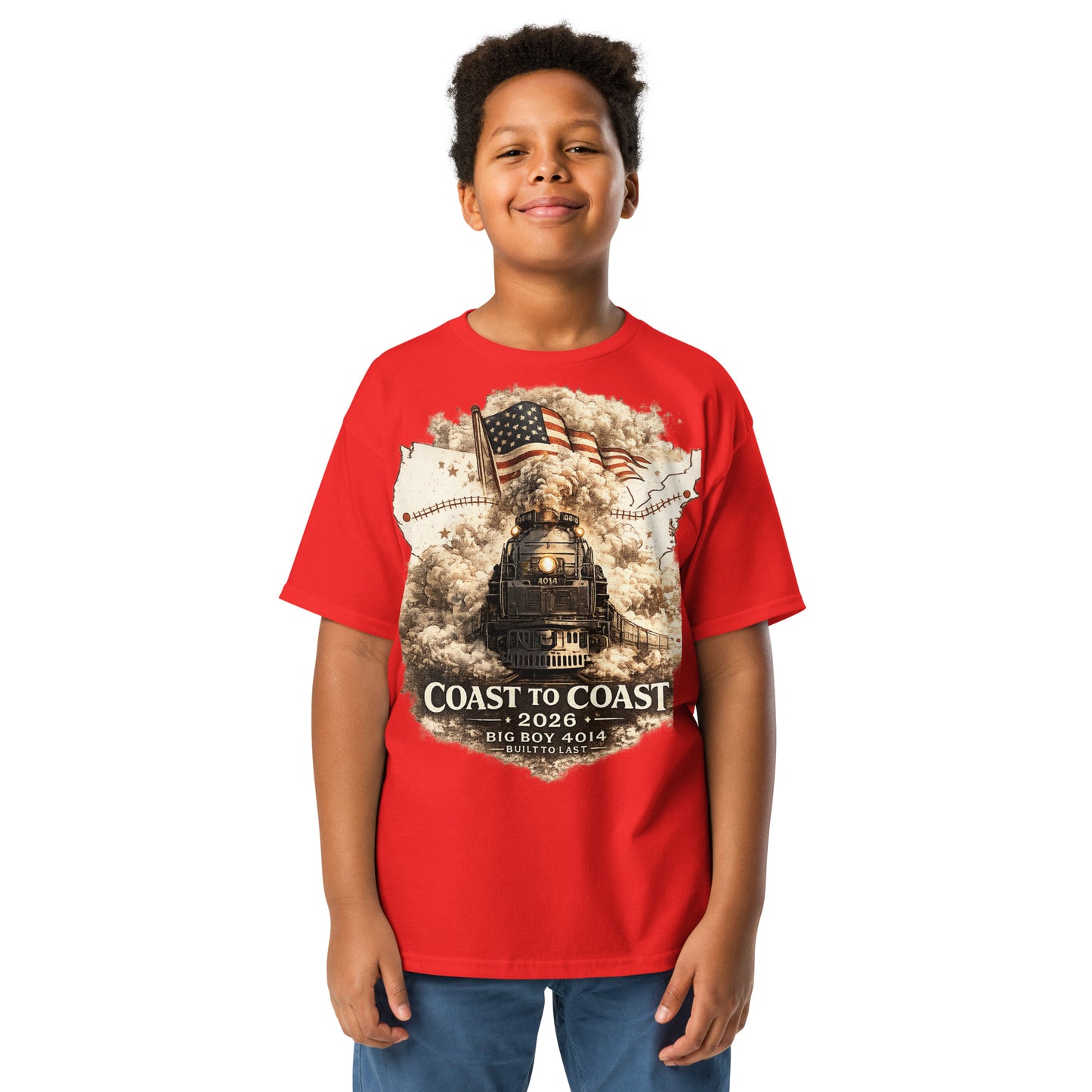 Child wearing a red t-shirt featuring the Big Boy 4014 steam locomotive, a waving American flag, and a US map showing a track route, with text reading "Coast to Coast 2026", "Big Boy 4014", and "Built To Last".