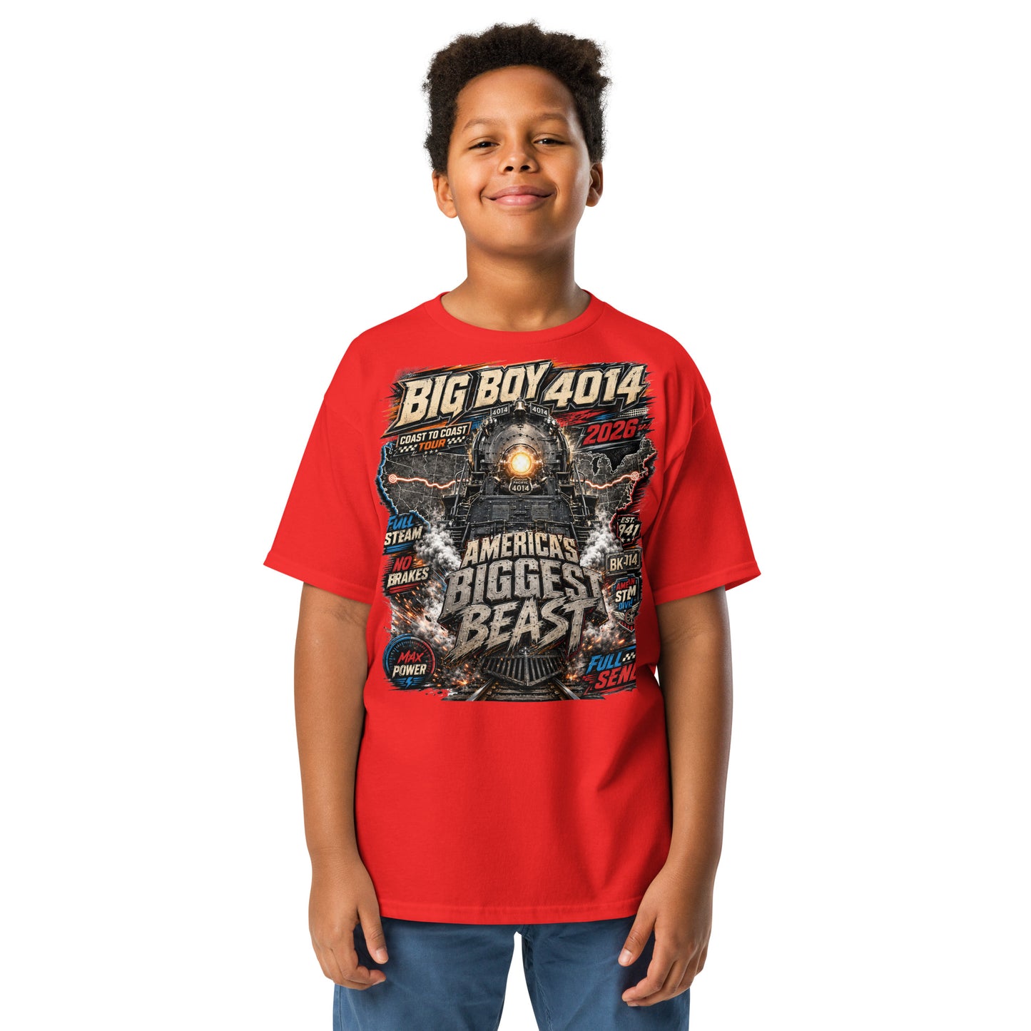 Child wearing a red t-shirt featuring a high-energy, colorful graphic of the Big Boy 4014 steam locomotive backed by a US map, with bold text reading "BIG BOY 4014", "COAST TO COAST TOUR 2026", "AMERICA'S BIGGEST BEAST", "FULL STEAM", "NO BRAKES", "MAX POWER", and "FULL SEND".