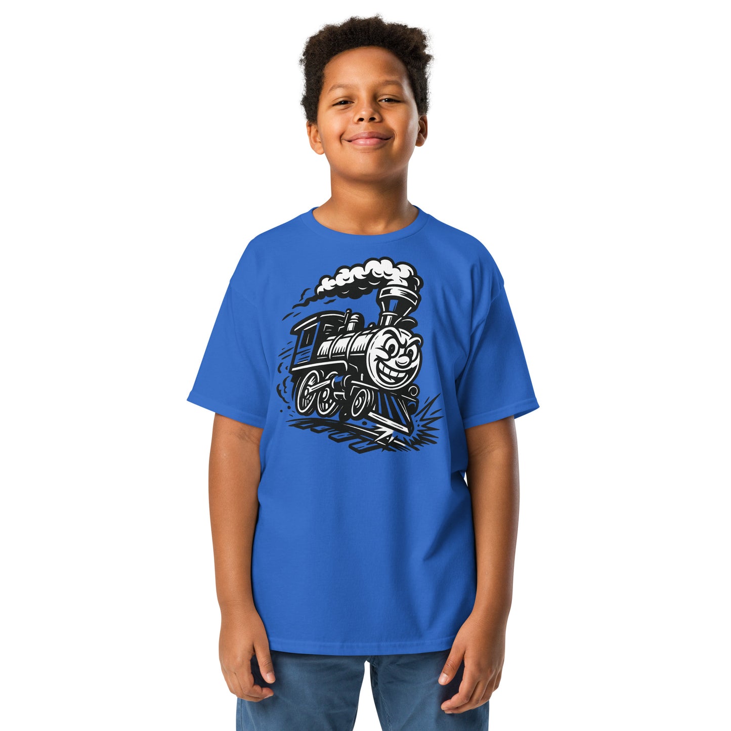 Child wearing a blue t-shirt with a train graphic on a white background