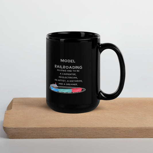 Glossy black 15 oz mug with Model Railroading quote text on a wooden board, handle right